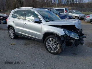 2012 Volkswagen Tiguan SE with VIN WVGAV7AX2CW543003, listed as a IAAI auction lot 41803970 with 187,639 mi miles and . Bid and sale history available at DreamBid. Image 1.