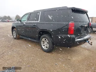 2016 Chevrolet Suburban LT with VIN 1GNSKHKC9GR112933, listed as a IAAI auction lot 41618685 with 188,921 mi miles. Bid and sale history available at carsss.com. Image 3.
