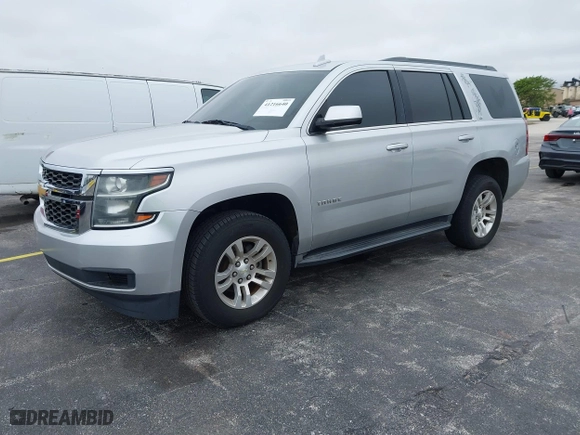 2016 Chevrolet Tahoe LS with VIN 1GNSCAKC5GR369222, listed as a IAAI auction lot 41216640 with 95,549 mi miles. Bid and sale history available at carsss.com. Image 2.