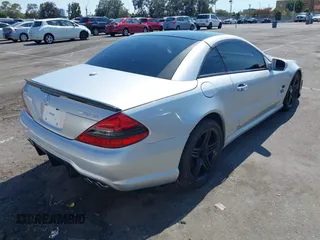 2009 Mercedes-Benz SL 55/63 AMG with VIN WDBSK70F69F148436, listed as a IAAI auction lot 42770233 with 120,523 mi miles and . Bid and sale history available at DreamBid. Image 4.