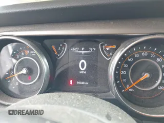 2019 Jeep Wrangler Unlimited Sport S with VIN 1C4HJXDG1KW603345, listed as a IAAI auction lot 42474523 with 90,048 mi miles and . Bid and sale history available at DreamBid. Image 7.