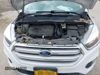 2018 Ford Escape SE z VIN 1FMCU9GDXJUC99453, wystawiony jako IAAI lot #42195202 z przebiegiem 191 840 mil mil oraz . Historia ofert i sprzedaży dostępna na DreamBid. Obrazek 10.
