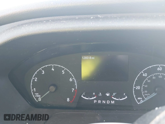 2022 Ford Transit Cargo z VIN 1FTBW3X81NKA04543, wystawiony jako IAAI lot #41763336 z przebiegiem 128 518 mil mil oraz . Historia ofert i sprzedaży dostępna na DreamBid. Obrazek 7.