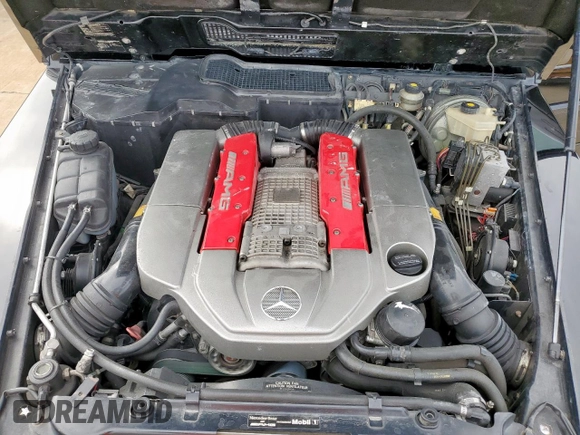 2005 Mercedes-Benz G with VIN WDCYR71E25X161101, listed as a Copart auction lot 49130785 with 60,053 mi miles and Clean Title. Bid and sale history available at DreamBid. Image 12.