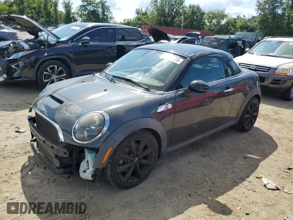 2015 MINI Coupe S z VIN WMWSX3C55FT409449, wystawiony jako Copart lot #66574174 z przebiegiem 99 155 mil mil oraz Szkody całkowita. Historia ofert i sprzedaży dostępna na DreamBid. Obrazek 1.