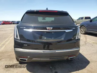 2023 Cadillac XT5 AWD Sport with VIN 1GYKNGRS8PZ100581, listed as a Copart auction lot 55157035 with 14,637 mi miles and Salvage title. Bid and sale history available at DreamBid. Image 6.