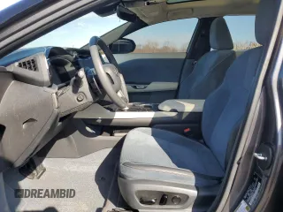 2023 Lexus RZ 450e Premium z VIN JTJAAAAB5PA007146, wystawiony jako Copart lot #50764805 z przebiegiem 20 747 mil mil oraz Szkody całkowita. Historia ofert i sprzedaży dostępna na DreamBid. Obrazek 7.
