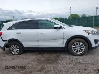 2016 Kia Sorento LX with VIN 5XYPG4A36GG035639, listed as a IAAI auction lot 42140364 with 142,711 mi miles. Bid and sale history available at carsss.com. Image 14.