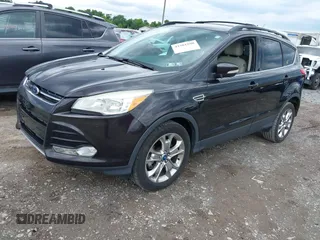 2013 Ford Escape SEL z VIN 1FMCU9H98DUB78564, wystawiony jako IAAI lot #42381290 z przebiegiem 89 728 mil mil oraz . Historia ofert i sprzedaży dostępna na DreamBid. Obrazek 2.