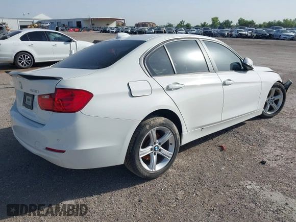 2014 BMW 3 Series 328i with VIN WBA3A5G5XENP32345, listed as a IAAI auction lot 42303835 with 100,235 mi miles and . Bid and sale history available at DreamBid. Image 4.