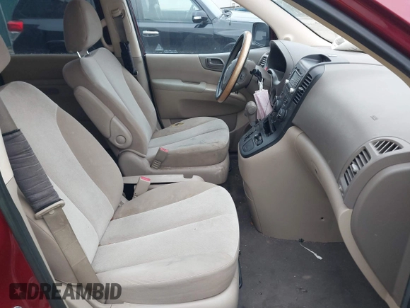 2012 Kia Sedona LX with VIN KNDMG4C75C6422392, listed as a IAAI auction lot 41235462 with 211,653 mi miles. Bid and sale history available at carsss.com. Image 5.