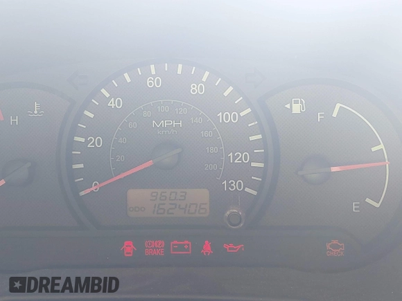 2004 Hyundai Accent with VIN KMHCF35C94U315390, listed as a IAAI auction lot 41391877 with 162,406 mi miles. Bid and sale history available at carsss.com. Image 7.