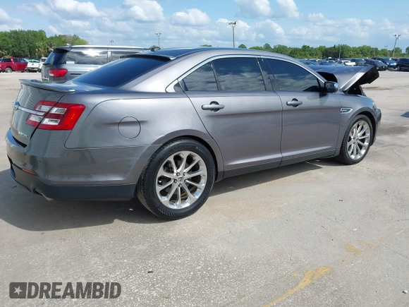 2014 Ford Taurus Limited with VIN 1FAHP2F89EG102814, listed as a IAAI auction lot 41999304 with 254,644 mi miles. Bid and sale history available at carsss.com. Image 4.