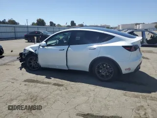 2024 Tesla Model Y Long Range с VIN 7SAYGDEE6RF157415, выставлен на аукционе Copart как лот 54950915 с пробегом 20 567 миль миль и Списание • Salvage title. История ставок и продаж доступна на DreamBid. Изображение 2.
