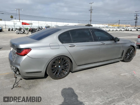 2022 BMW 7 Series 740i with VIN WBA7T2C02NCG97593, listed as a Copart auction lot 61861765 with 27,637 mi miles and Clean title. Bid and sale history available at DreamBid. Image 3.