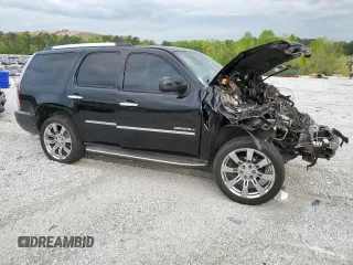 2014 GMC Yukon Denali z VIN 1GKS1EEF4ER130225, wystawiony jako Copart lot #53042185 z przebiegiem Nie podano mil oraz Szkody całkowita. Historia ofert i sprzedaży dostępna na DreamBid. Obrazek 4.
