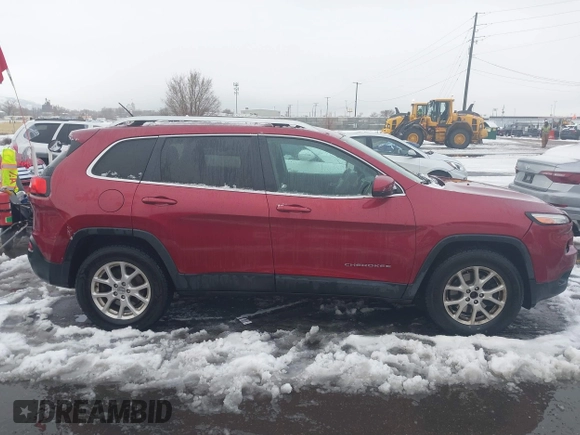 2014 Jeep Cherokee Latitude with VIN 1C4PJMCB8EW166853, listed as a IAAI auction lot 41579386 with 251,683 mi miles and . Bid and sale history available at DreamBid. Image 13.