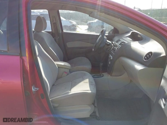 2010 Toyota Yaris with VIN JTDBT4K30A1371525, listed as a IAAI auction lot 41923910 with 149,348 mi miles. Bid and sale history available at carsss.com. Image 5.