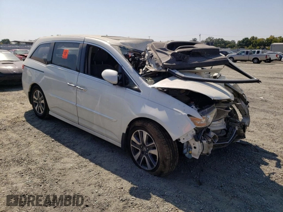 2015 Honda Odyssey Touring Elite z VIN 5FNRL5H90FB033511, wystawiony jako Copart lot #67718683 z przebiegiem Nie podano mil oraz Szkoda całkowita • Salvage title. Historia ofert i sprzedaży dostępna na DreamBid. Obrazek 4.