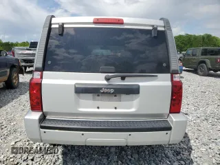 2009 Jeep Commander Sport with VIN 1J8HH48K89C540189, listed as a Copart auction lot 52552235 with 258,377 mi miles and Salvage title. Bid and sale history available at DreamBid. Image 6.
