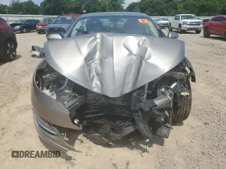 2015 Lincoln MKZ Hybrid with VIN 3LN6L2LU3FR608367, listed as a Copart auction lot 58945505 with 131,829 mi miles and Salvage title. Bid and sale history available at DreamBid. Image 5.
