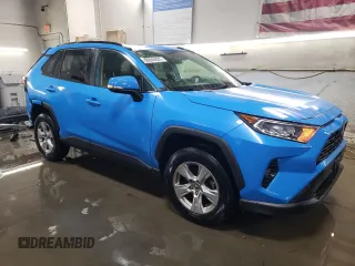 2019 Toyota RAV4 XLE with VIN JTMP1RFVXKD011571, listed as a Copart auction lot 89066895 with 81,955 mi miles and Salvage Title. Bid and sale history available at DreamBid. Image 4.