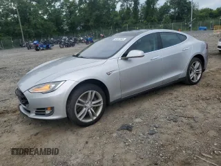 2014 Tesla Model S 60 z VIN 5YJSA1H17EFP46060, wystawiony jako Copart lot #65387805 z przebiegiem Nie podano mil oraz Czysty tytuł • Clean title. Historia ofert i sprzedaży dostępna na DreamBid. Obrazek 1.