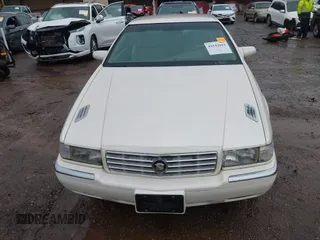 1997 Cadillac Eldorado ESC z VIN 1G6EL12Y6VU614754, wystawiony jako IAAI lot #41543611 z przebiegiem 73 273 mil mil oraz . Historia ofert i sprzedaży dostępna na DreamBid. Obrazek 6.