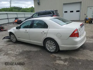 2012 Ford Fusion Hybrid with VIN 3FADP0L34CR414234, listed as a Copart auction lot 58891715 with 147,409 mi miles and Salvage title. Bid and sale history available at DreamBid. Image 2.