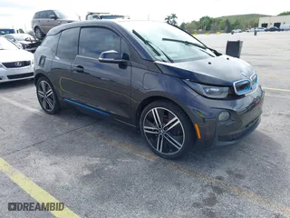 2014 BMW i3 with VIN WBY1Z4C56EVX63285, listed as a IAAI auction lot 41672245 with 70,229 mi miles. Bid and sale history available at carsss.com. Image 1.
