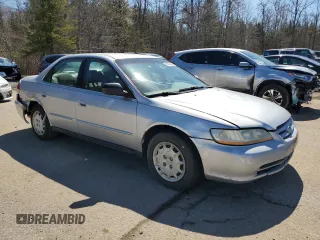 2002 Honda Accord LX z VIN 1HGCG56402A160961, wystawiony jako Copart lot #53092205 z przebiegiem 262 152 mil mil oraz Czysty tytuł • Clean title. Historia ofert i sprzedaży dostępna na DreamBid. Obrazek 4.