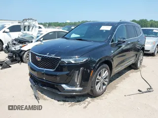 2021 Cadillac XT6 Premium Luxury with VIN 1GYKPDRS0MZ153523, listed as a IAAI auction lot 42770895 with 19,843 mi miles and . Bid and sale history available at DreamBid. Image 2.