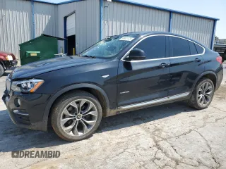 2018 BMW X4 xDrive28i with VIN 5UXXW3C58J0Y66048, listed as a Copart auction lot 58941175 with 99,579 mi miles and Salvage title. Bid and sale history available at DreamBid. Image 1.