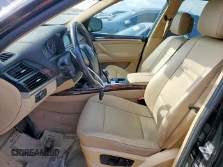 2012 BMW X5 35i с VIN 5UXZV4C52CL988794, выставлен на аукционе Copart как лот 61688485 с пробегом Не указан миль и Чистый • Clean title. История ставок и продаж доступна на DreamBid. Изображение 7.
