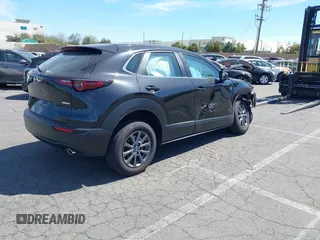 2024 Mazda CX-30 2.5 S with VIN 3MVDMBAM5RM687164, listed as a IAAI auction lot 41465592 with 4,705 mi miles. Bid and sale history available at carsss.com. Image 4.