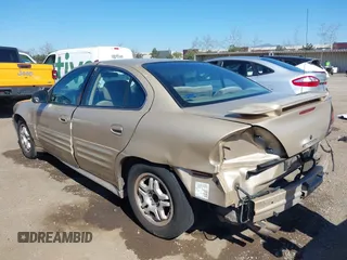 2001 Pontiac Grand Am SE1 with VIN 1G2NF52T01C232451, listed as a IAAI auction lot 41629388 with 152,299 mi miles. Bid and sale history available at carsss.com. Image 6.
