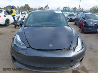2023 Tesla Model 3 with VIN 5YJ3E1EA7PF671943, listed as a IAAI auction lot 41896811 with 37,386 mi miles. Bid and sale history available at carsss.com. Image 13.