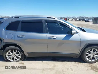 2016 Jeep Cherokee 75th Anniversary with VIN 1C4PJLCB1GW217638, listed as a IAAI auction lot 41689623 with 124,630 mi miles and . Bid and sale history available at DreamBid. Image 13.