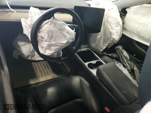 2021 Tesla Model 3 Standard Range Plus z VIN 5YJ3E1EA7MF986964, wystawiony jako Copart lot #55119995 z przebiegiem Nie podano mil oraz Szkody całkowita. Historia ofert i sprzedaży dostępna na DreamBid. Obrazek 8.
