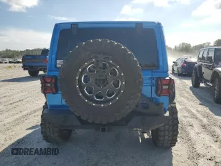 2023 Jeep Wrangler Rubicon with VIN 1C4HJXFN5PW504658, listed as a Copart auction lot 69063484 with 32,490 mi miles and Salvage title. Bid and sale history available at DreamBid. Image 6.