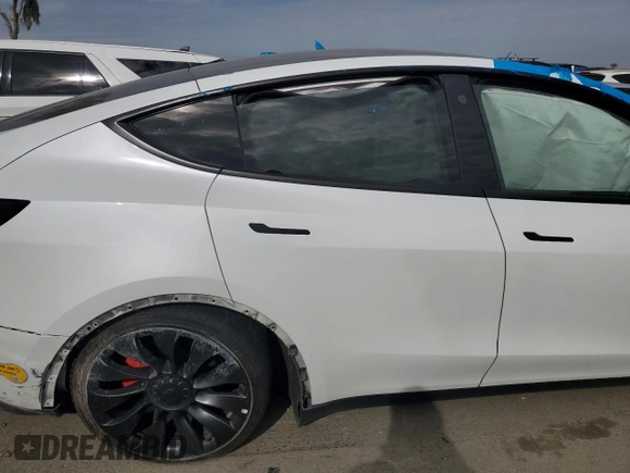2022 Tesla Model Y Performance with VIN 7SAYGDEF1NF410241, listed as a Copart auction lot 45017155 with 42,652 mi miles and Salvage Title. Bid and sale history available at DreamBid. Image 11.