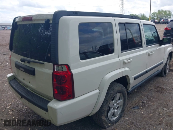2007 Jeep Commander with VIN 1J8HG48N77C611652, listed as a IAAI auction lot 42144524 with 211,976 mi miles. Bid and sale history available at carsss.com. Image 4.