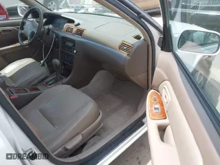 2000 Toyota Camry CE with VIN JT2BG22K3Y0406082, listed as a IAAI auction lot 42053116 with 171,219 mi miles. Bid and sale history available at carsss.com. Image 5.