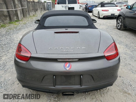 2014 Porsche Boxster с VIN WP0CA2A85EK120088, выставлен на аукционе Copart как лот 61135784 с пробегом 24 667 миль миль и Списание • Salvage title. История ставок и продаж доступна на DreamBid. Изображение 6.
