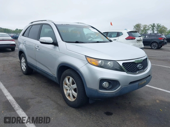 2012 Kia Sorento LX with VIN 5XYKTDA60CG296159, listed as a IAAI auction lot 42197638 with 198,676 mi miles. Bid and sale history available at carsss.com. Image 1.