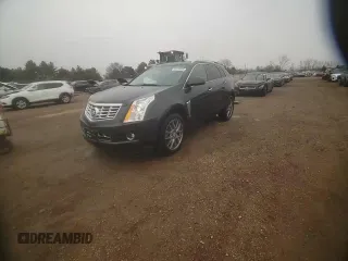 2014 Cadillac SRX Performance Collection z VIN 3GYFNCE36ES661204, wystawiony jako Copart lot #53478095 z przebiegiem 66 613 mil mil oraz Szkoda całkowita • Salvage title. Historia ofert i sprzedaży dostępna na DreamBid. Obrazek 13.