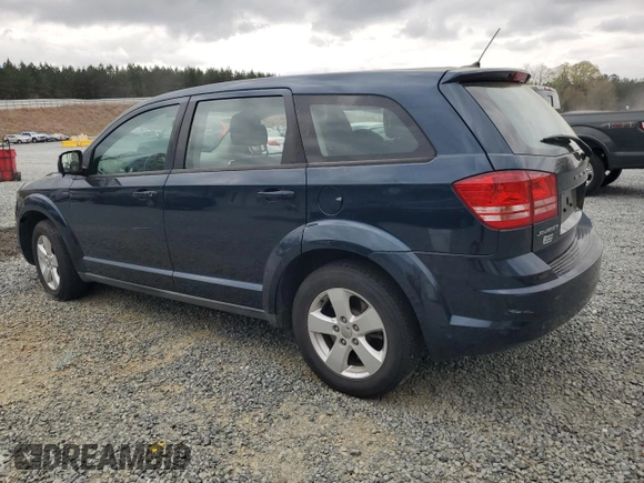 2013 Dodge Journey American Value with VIN 3C4PDCAB6DT577273, listed as a Copart auction lot 50627295 with 139,775 mi miles and Salvage title. Bid and sale history available at DreamBid. Image 2.