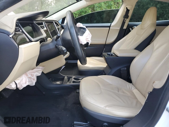 2013 Tesla Model S с VIN 5YJSA1CN3DFP05949, выставлен на аукционе Copart как лот 61244825 с пробегом 174 022 миль миль и Списание • Salvage title. История ставок и продаж доступна на DreamBid. Изображение 7.