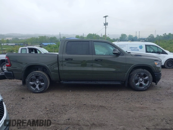 2021 Ram 1500 Lone Star with VIN 1C6SRFFT6MN695393, listed as a IAAI auction lot 42344282 with 12,796 mi miles and . Bid and sale history available at DreamBid. Image 14.