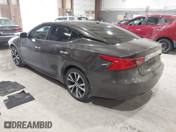 2016 Nissan Maxima Platinum with VIN 1N4AA6AP3GC404618, listed as a IAAI auction lot 42372458 with 133,968 mi miles and . Bid and sale history available at DreamBid. Image 3.